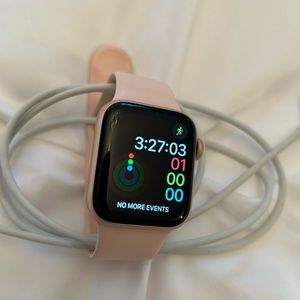 Series 4 Apple Watch in rose gold   Comes with pink sports band and charger.